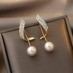 Load image into Gallery viewer, Lueur Pearl Drop Earrings | Crystal Paved Gold Tone