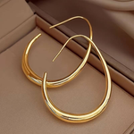 Load image into Gallery viewer, Métier Sculpted Gold Hoop Earrings | Fluid Teardrop Form