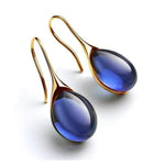Load image into Gallery viewer, Clarté Teardrop Crystal Earrings | Gold Cat’s Eye Design
