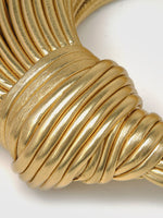 Load image into Gallery viewer, Lueur Sculpted Metallic Handbag | Gold Curved Silhouette
