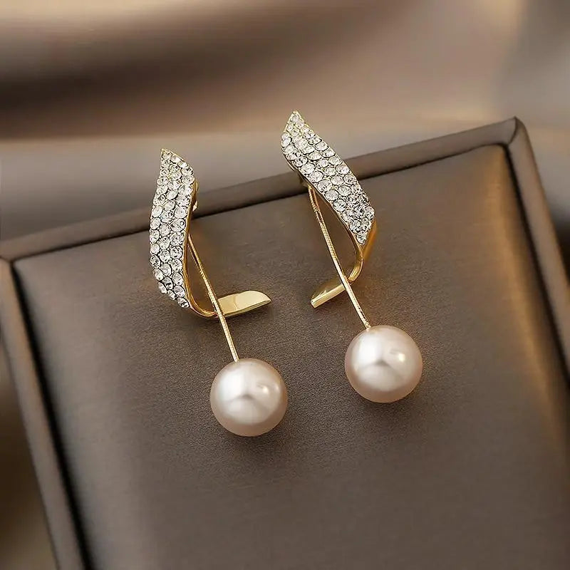 Lueur Pearl Drop Earrings | Crystal Paved Gold Tone