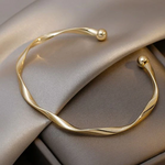 Load image into Gallery viewer, Twisted Open Cuff Bracelet | Minimalist Gold Bangle | Adjustable Fit
